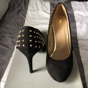 Gold studded black pumps